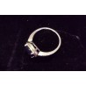 WHITE GOLD RING - 18 CARATS - DECORATED WITH A SAPPHIRE OF 7 X 5 MM - SIZE 48