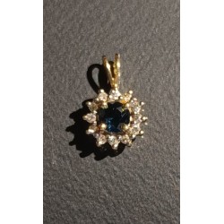 18 CARAT GOLD PENDANT DECORATED WITH A CENTRAL SAPPHIRE AND 12 BRILLANTS - Ref 095231