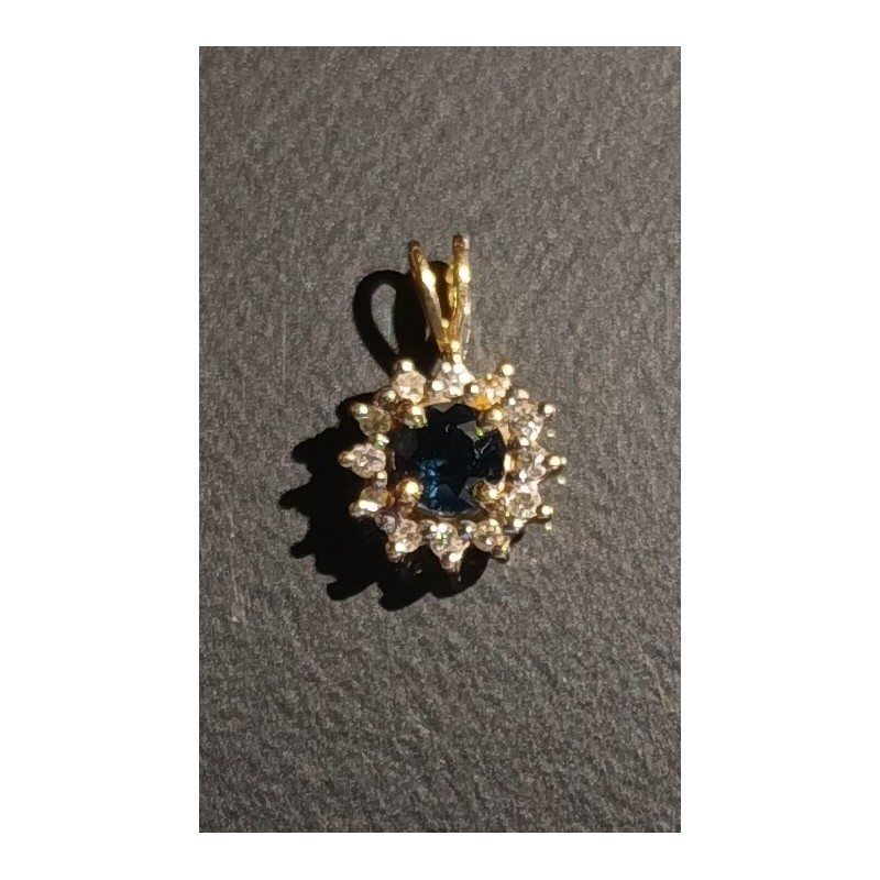 18 CARAT GOLD PENDANT DECORATED WITH A CENTRAL SAPPHIRE AND 12 BRILLANTS - Ref 095231